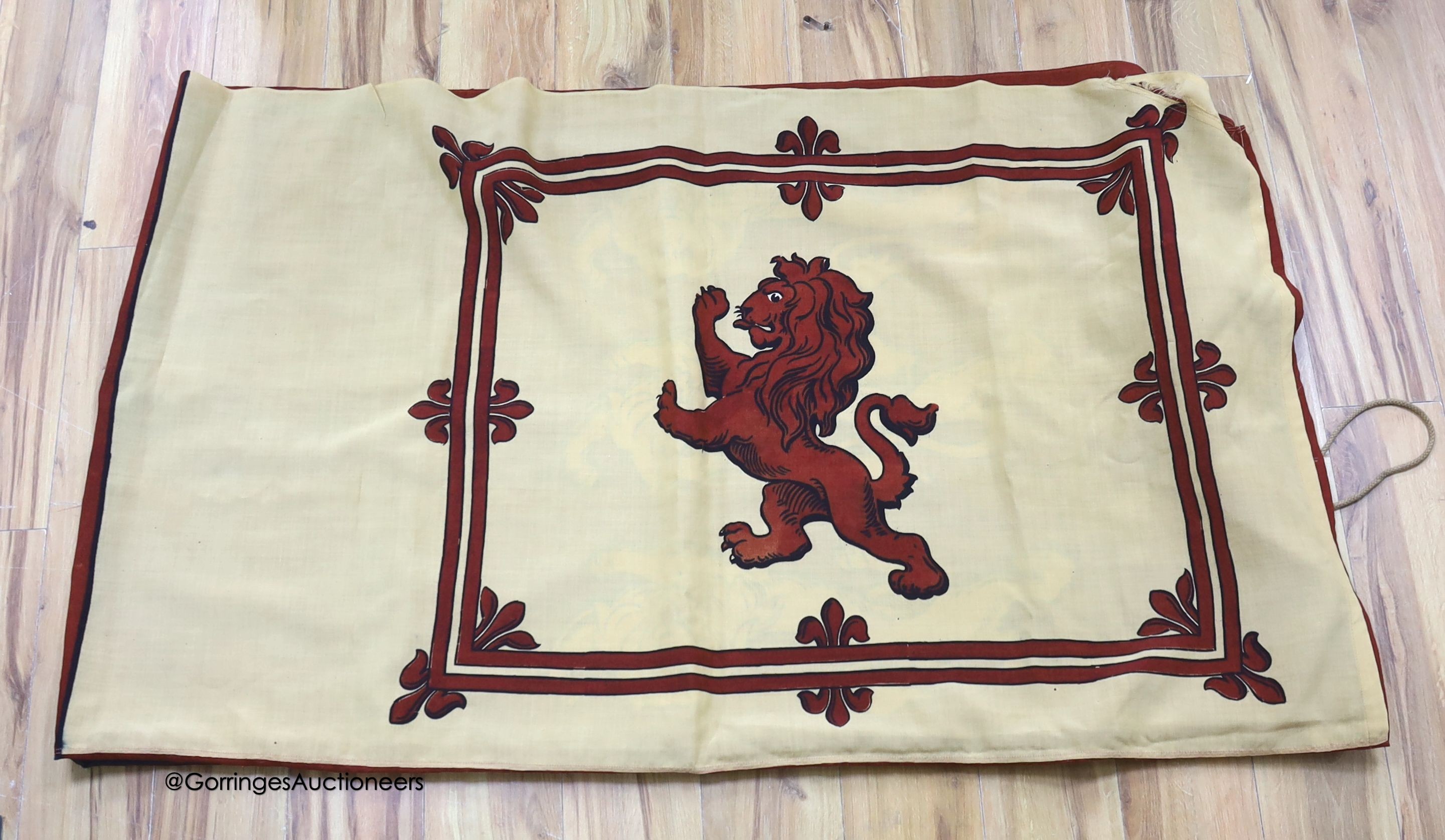 A large Royal Standard flag